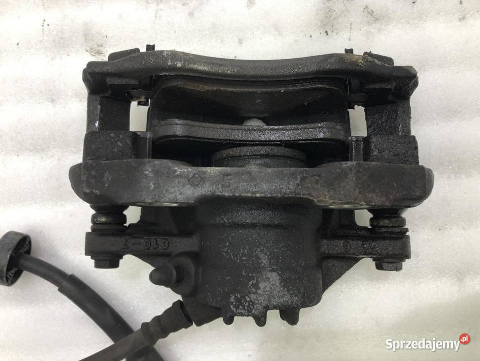 ZACISK PRAWY PRZÓD CITROEN C4 CACTUS 12 Układ hamulcowy