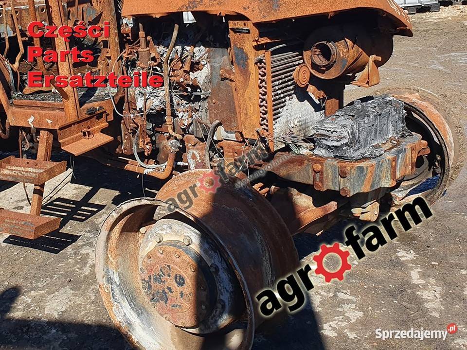 Holland TL100 części silnik skrzynia biegów