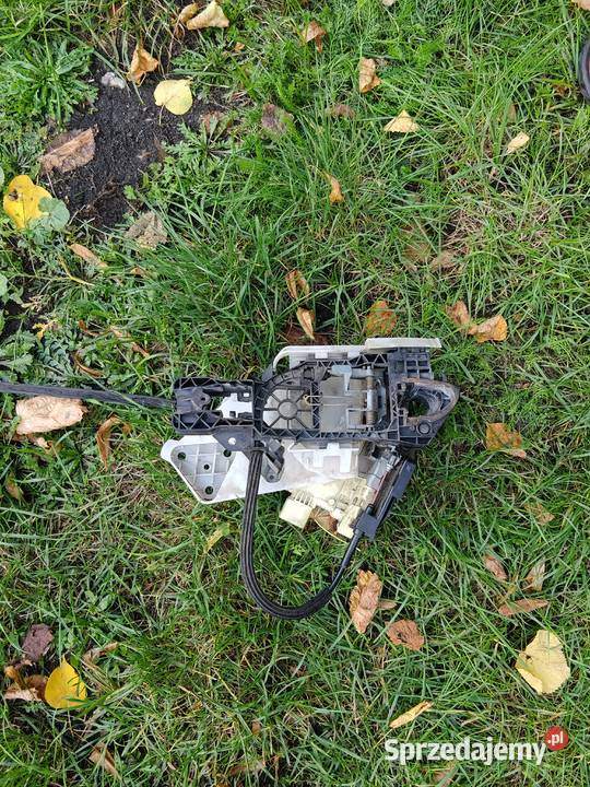 Zamek drzwi lewy tył passat b6