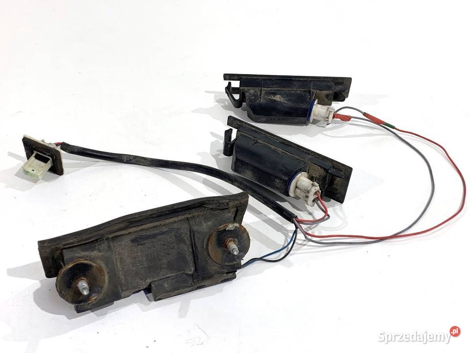 KLAMKA KLAPY TYŁ OPEL ASTRA H 461088395 Kombi osobowe