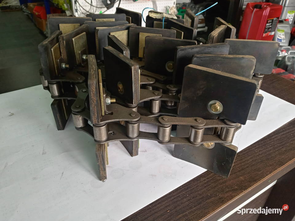 Łańcuch podajnika ziarnowego Holland 8000 sprzedam