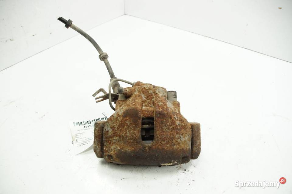 ZACISK HAMULCOWY PRZÓD LEWY AUDI A6 C6 osobowe Lipno