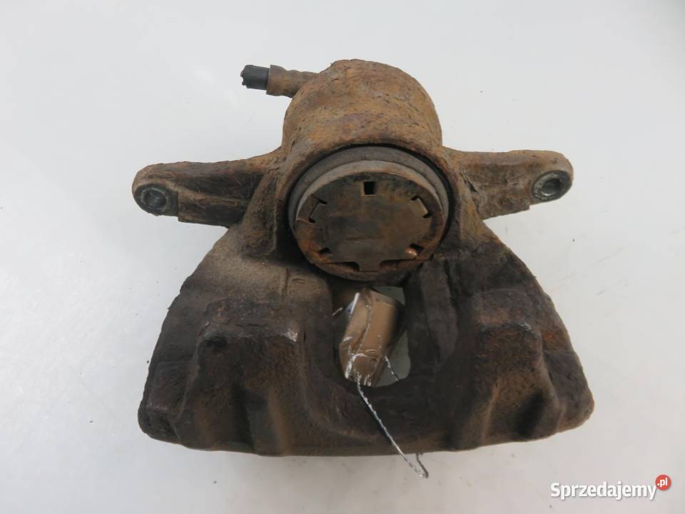 ZACISK LEWY PRZÓD TOYOTA AVENSIS II 20 D4D