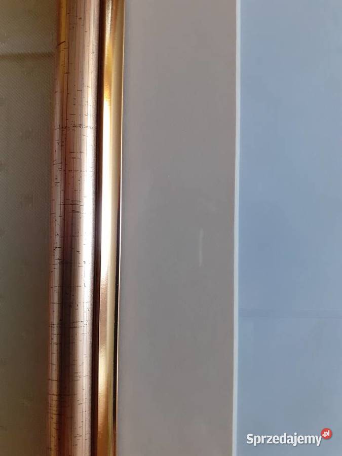 Nowe PassePartout w złotej ramie