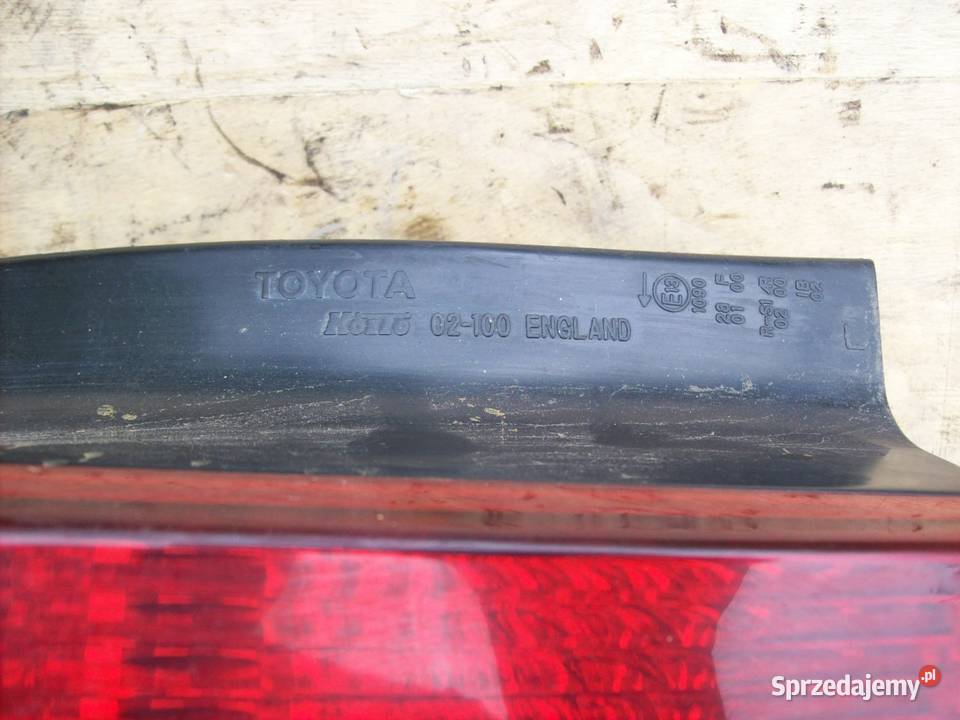 Corolla E12 HTB Lampa lewy tyl tylna lewa osobowe Mińsk Mazowiecki