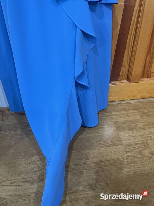 Piękna sukienka z falbanką XL idealna na różne