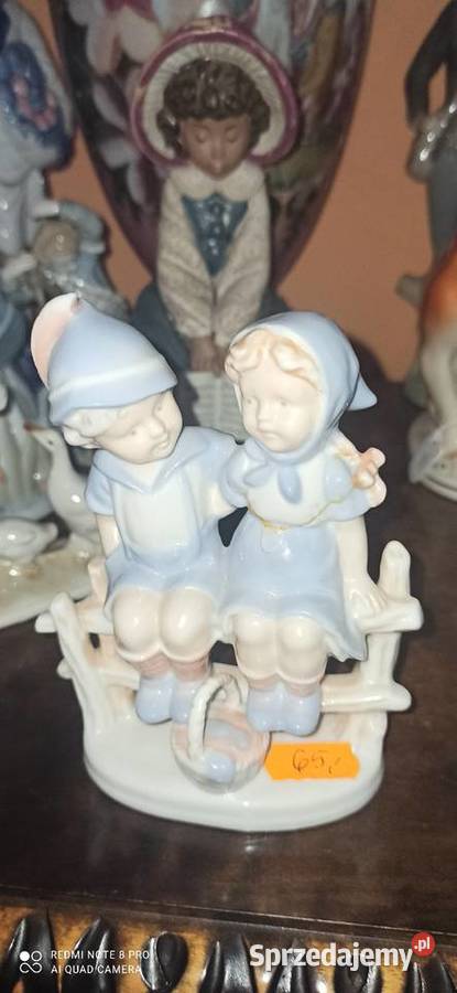 Figurka Dzieci na płocie z koszyczkiem SygTerra Gdańsk