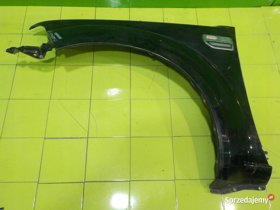 NISSAN NAVARA III D40 25 D 06r 5D blotnik lewy mazowieckie Suków