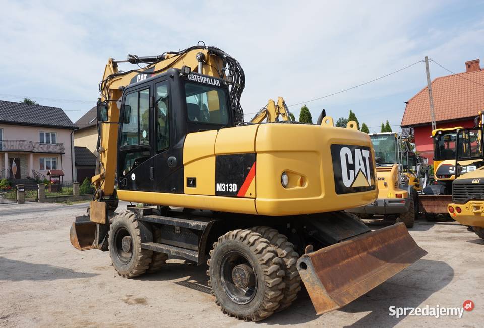 Koparka kołowa CAT M 313 D 2010 Rok produkcji 2010 Jeziorko sprzedam