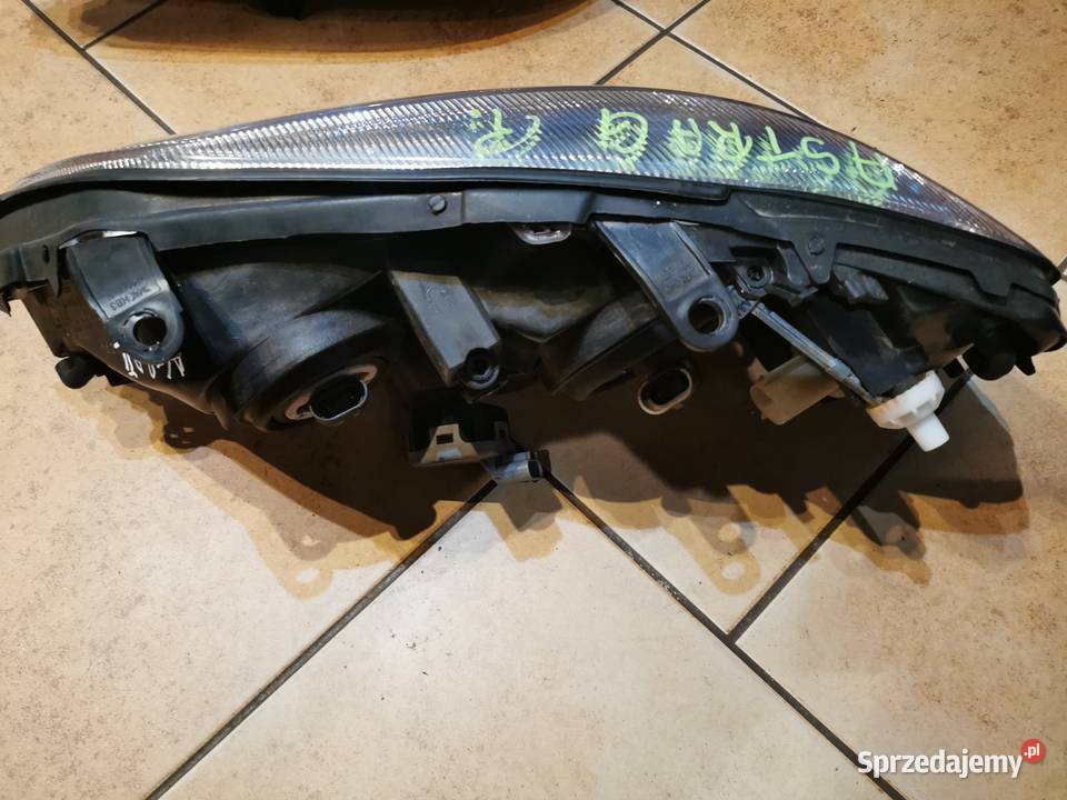 084421116R REFLEKTOR PRAWY OPEL ASTRA G Margonin