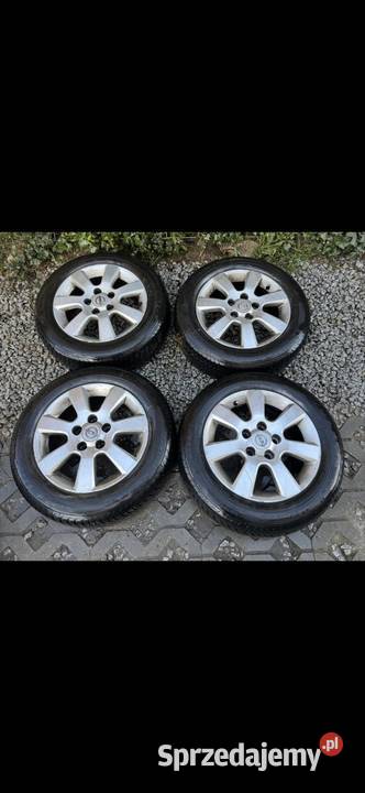 Felgi Opel 5x110 opony wielosezon 1856515 23r Krępiec