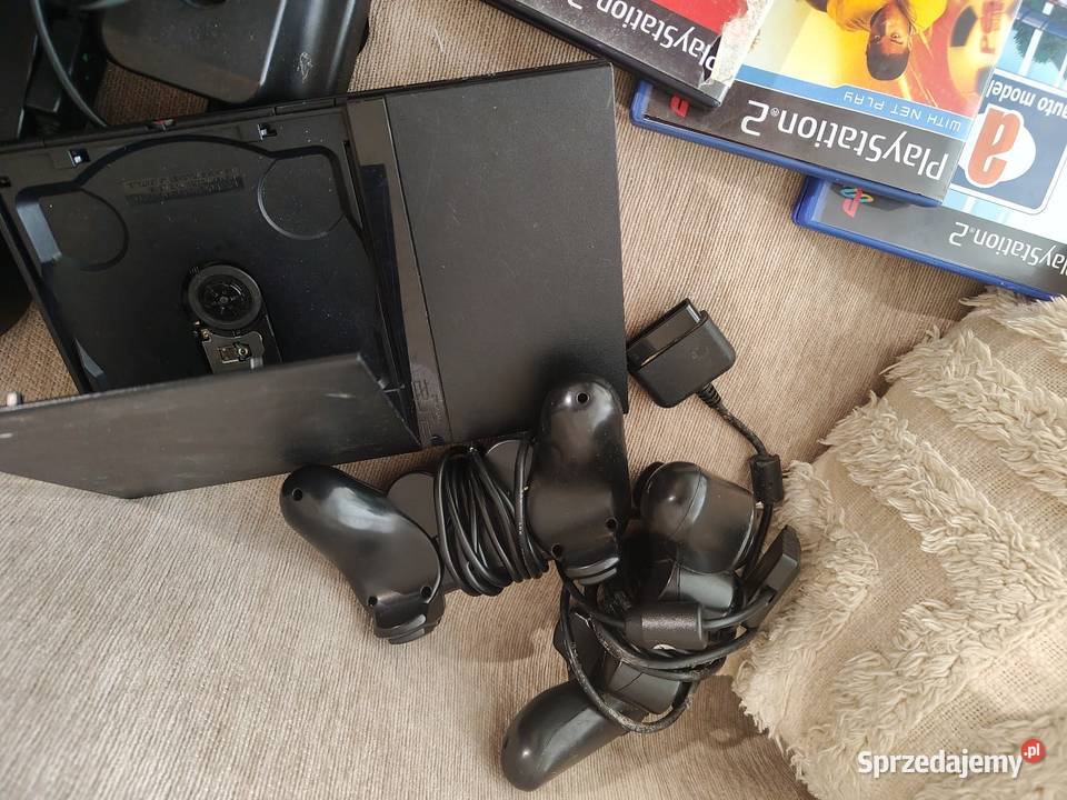 Konsola Sony 2 czarna kierownica 2 pady i gry mazowieckie Warszawa