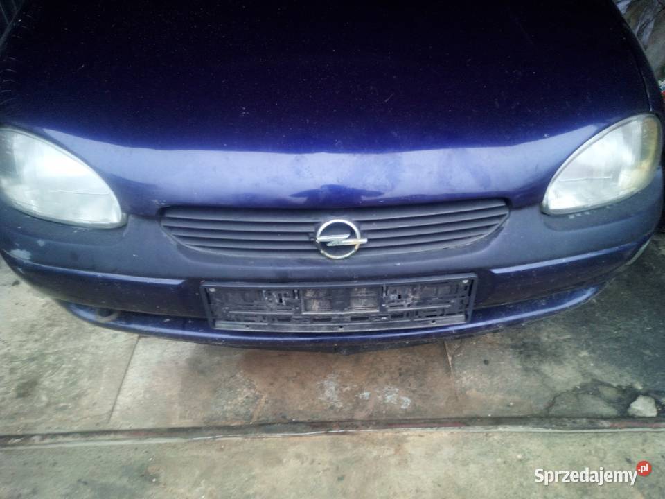 Opel Corsa b przód lampy zderzak maska