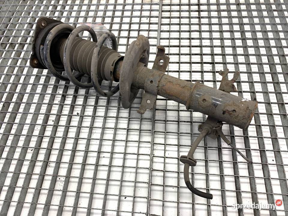 AMORTYZATOR PRAWY PRZÓD ZE SPRĘŻYNĄ RENAULT osobowe Amortyzatory