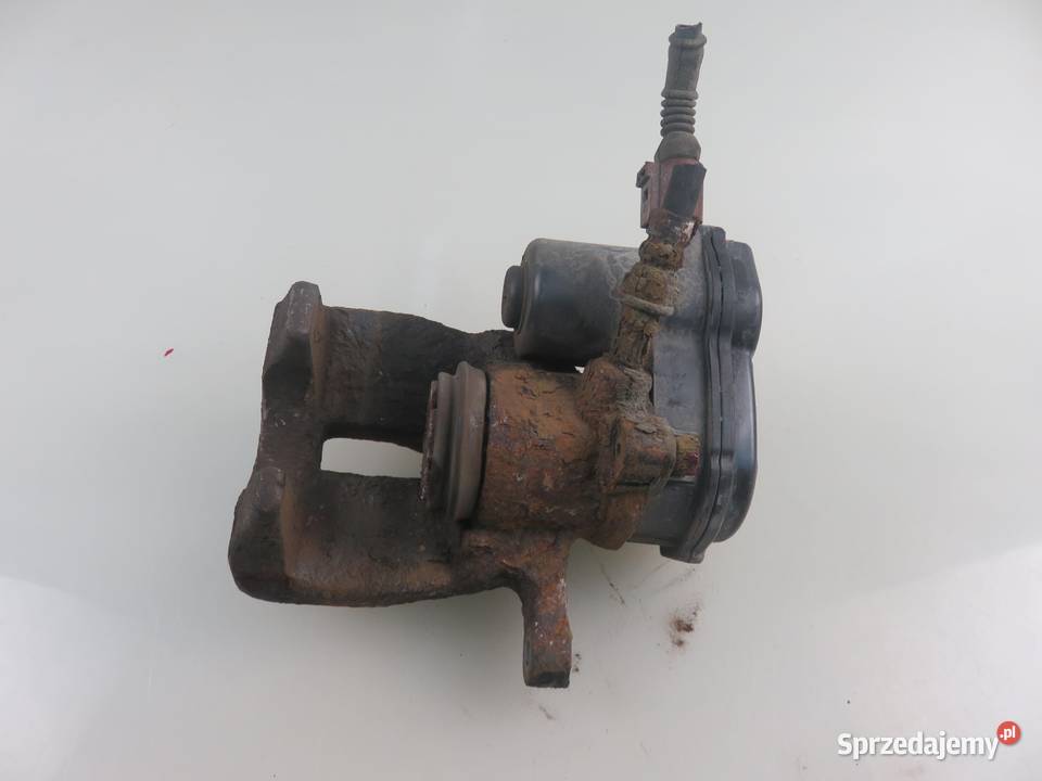 ZACISK LEWY TYŁ AUDI A4 B8 18 TFSI