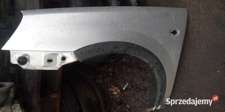 Błotnik przedni lewy OPEL CORSA C srebrny bez Margonin