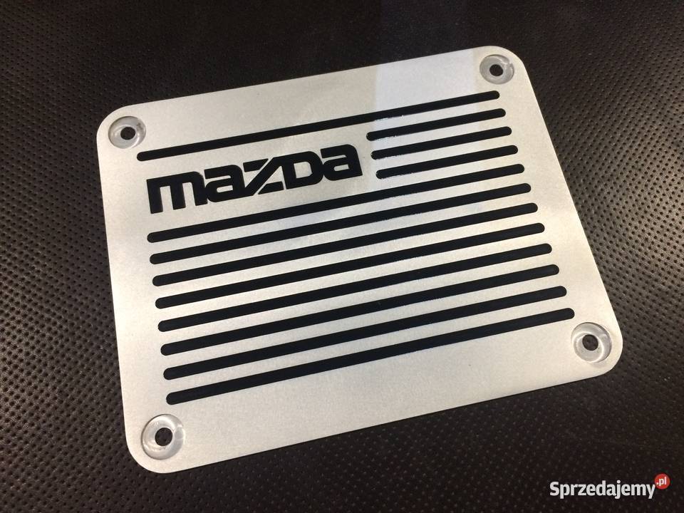 EMBLEMAT W DYWANIK MAZDA