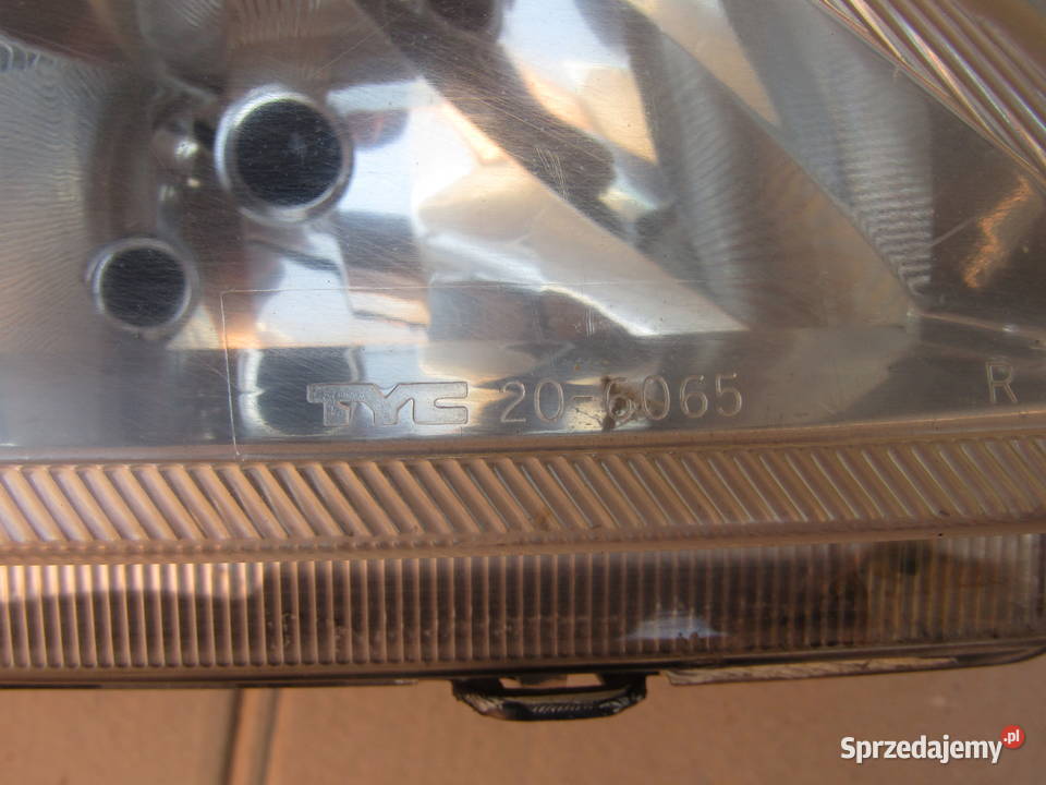LAMPA PRZEDNIA PRAWA OPEL CORSA C206065
