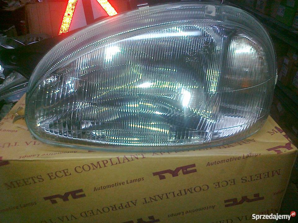 OPEL CORSA B REFLEKTOR H4 MAN LEWY NOWY TYC Pruszków