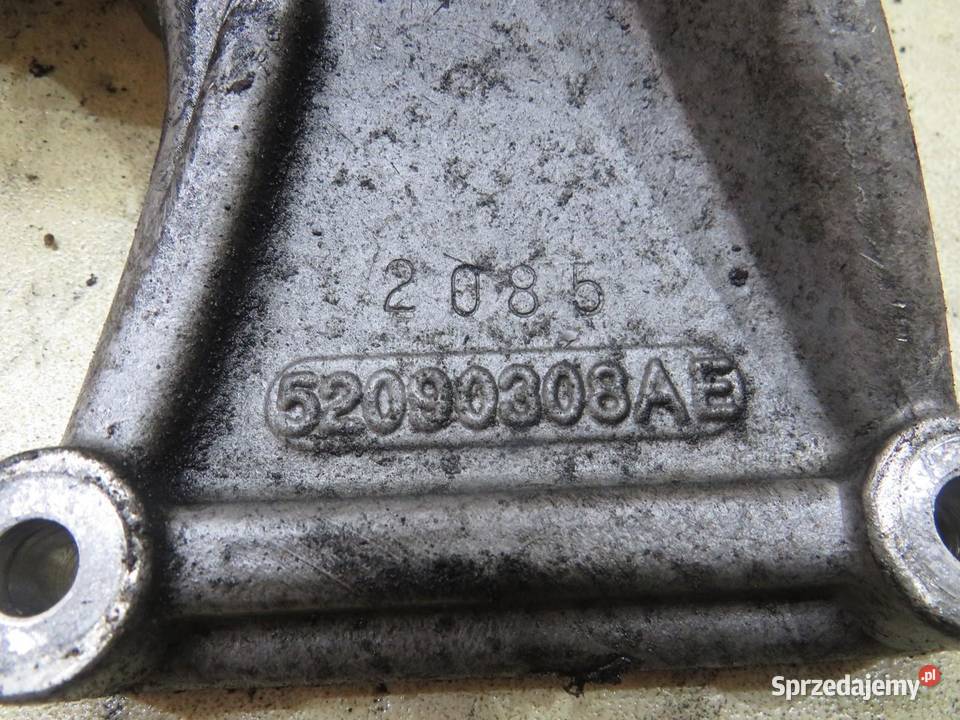 ŁAPA PODUSZKA SILNIKA JEEP WK 30 CRD 52090308AE Części samochodowe
