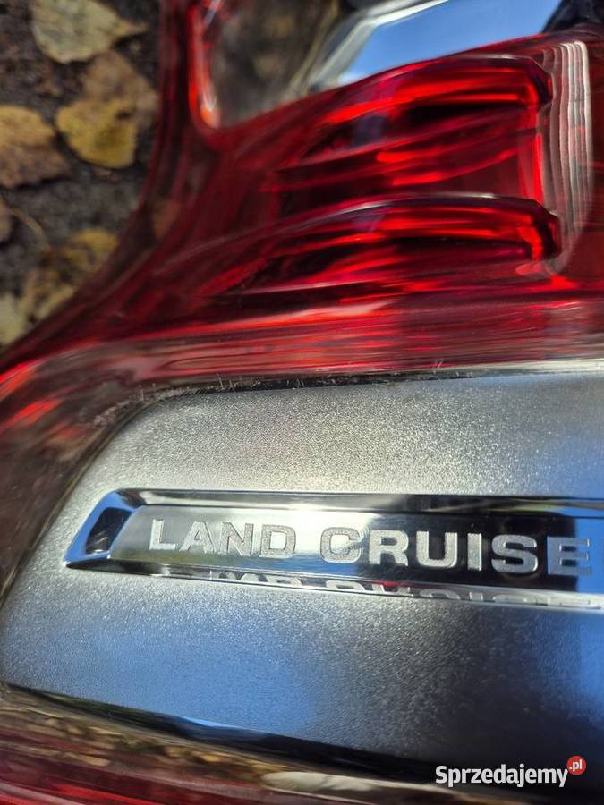 LAMPA TYLNA TOYOTA LAND CRUISER LEWA ORYGINAŁ Pionki
