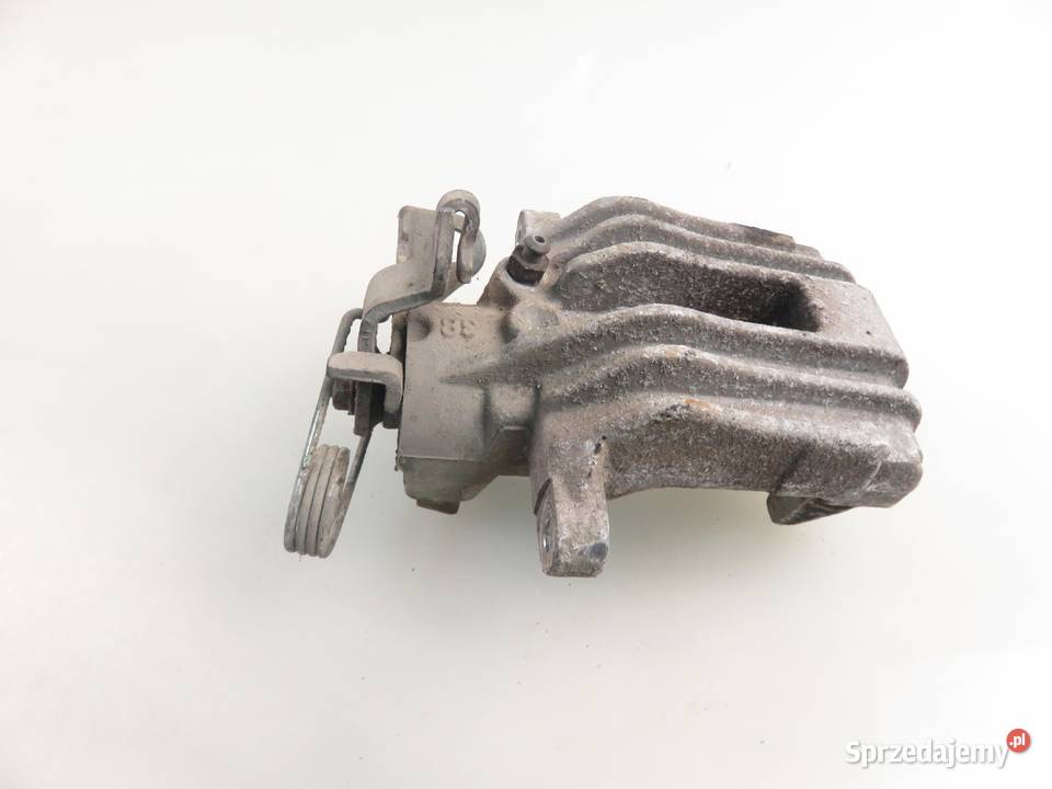 ZACISK PRAWY TYŁ VW PASSAT B5 19 TDI osobowe