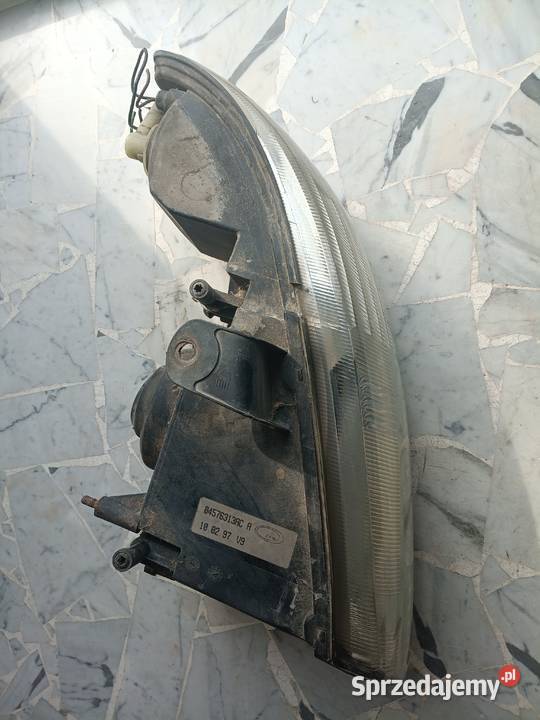 lampa chrysler grand voyager 1997 lewy przód Szydłowiec