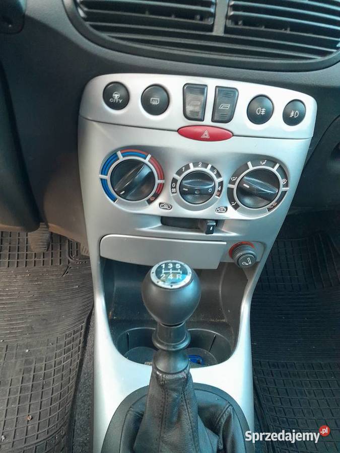 Fiat Punto 12 benzyna 60 2004r z de klima czarny sprowadzony Wronki