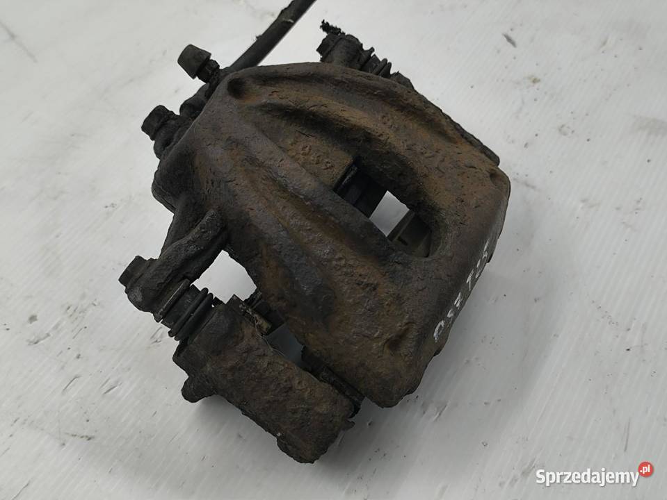 ZACISK LEWY TYŁ TOYOTA AVENSIS II T25 18 VVTI