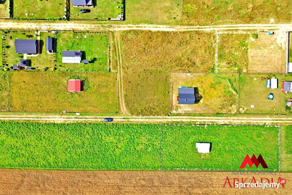 sprzedaży działki Nowiny 700m2 szambo