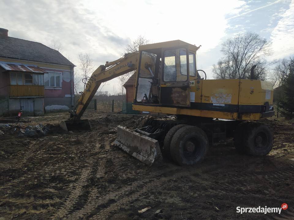 Koparka Caterpillar jcb liebherr Volvo wywrotka