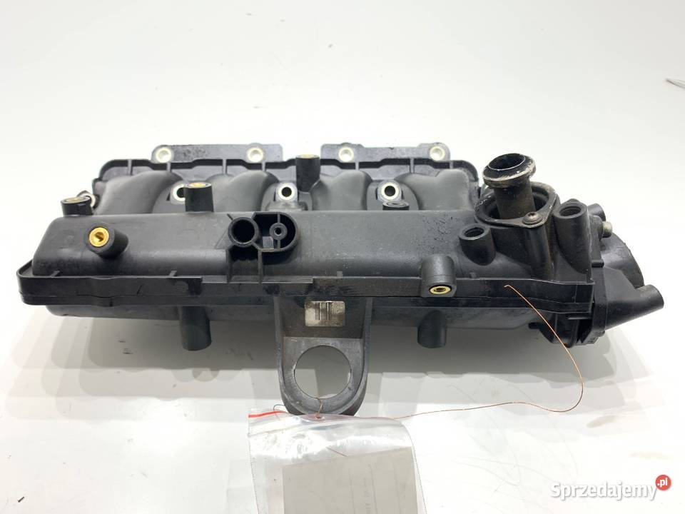 KOLEKTOR SSĄCY OPEL CORSA D 55213267 13 90 0614