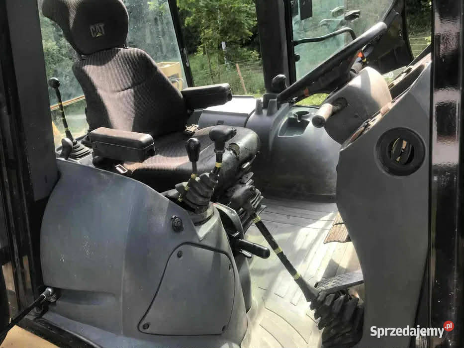 koparka koparko ładowarka CAT428 osoby prywatnej Narama