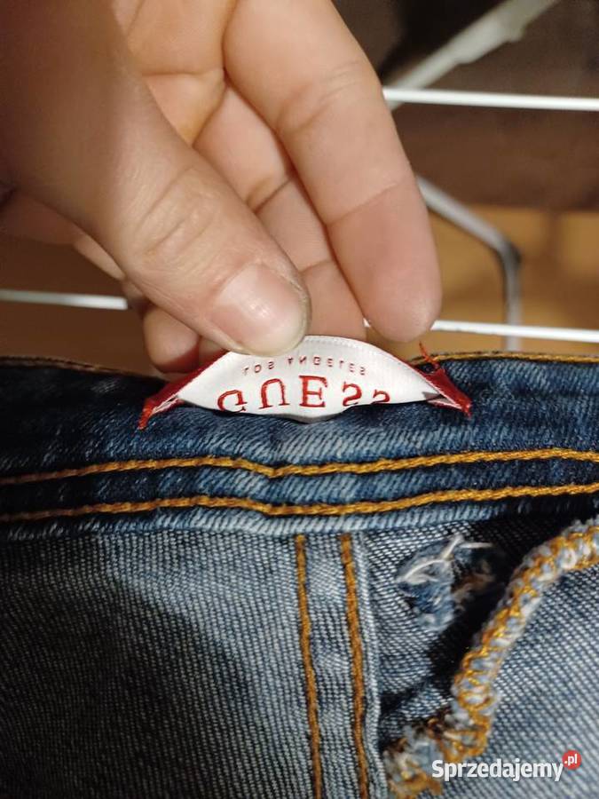 Męskie spodnie jeansowe z dziurą GUESS rozmiar śląskie Myszków