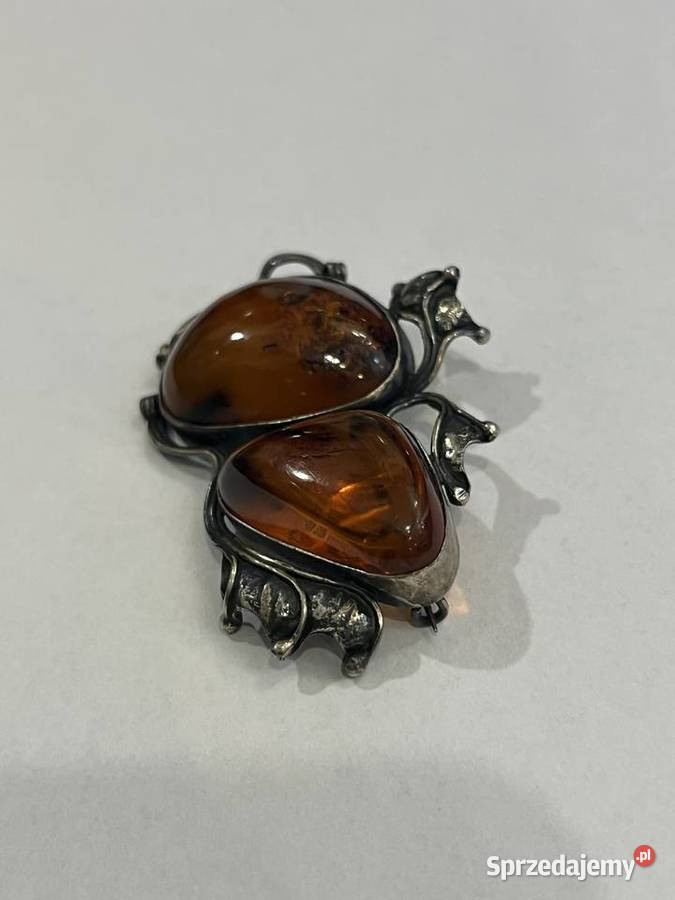 Srebrna broszka z okazałym bursztynem Kraków