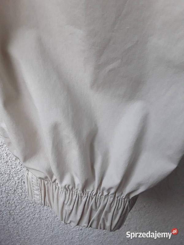 Kremowe spodnie parchute baggy Cropp r32 Warszawa