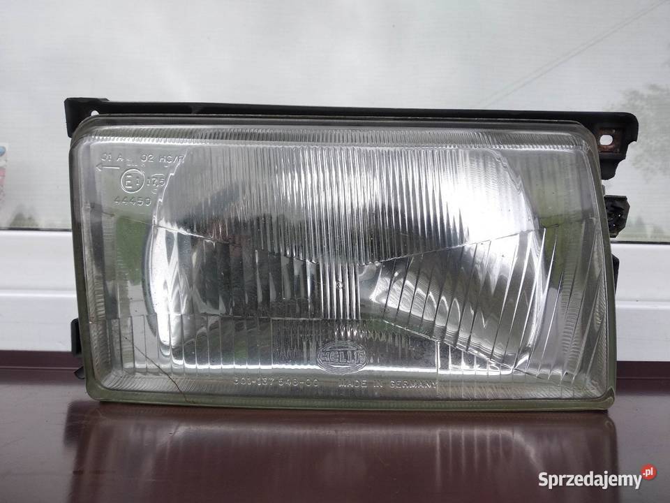 VW Polo II 86c2f lampa przednia prawa reflektor Sieradz