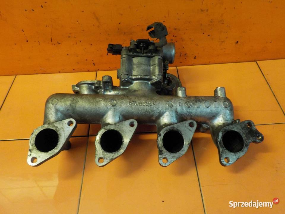 PAJERO III 25 TDI 06r kolektor ssacy MR577029 Suków