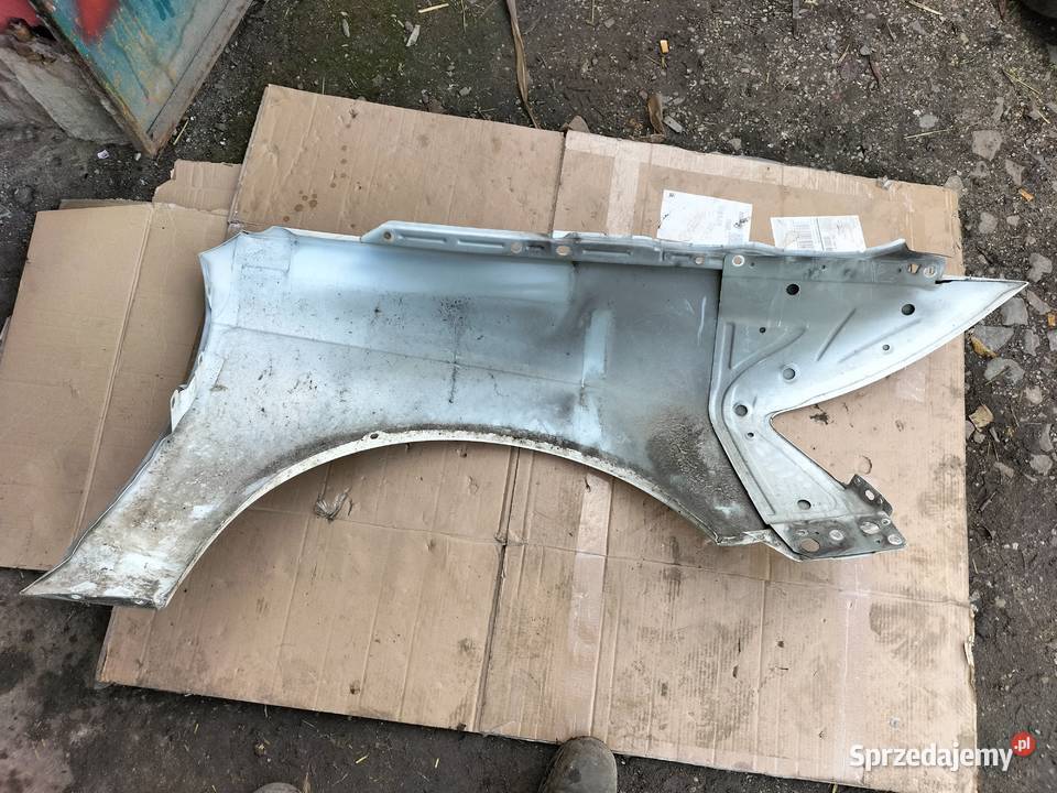 AUDI A6C6 A6 C6 BŁOTNIK LEWY PRZÓD BIAŁY Kamień-Kolonia