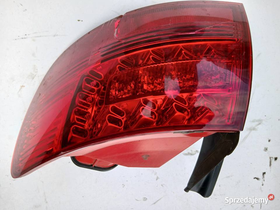Audi A6 C6 Lampa tylna prawy tył Valeo pęknięta Szczerbice