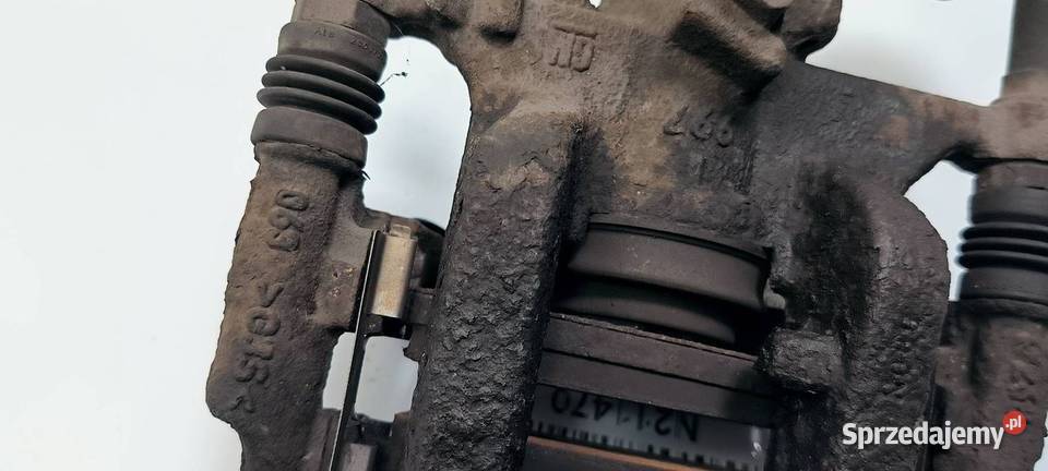 ZACISK HAMULCOWY TYŁ LEWY OPEL ASTRA J