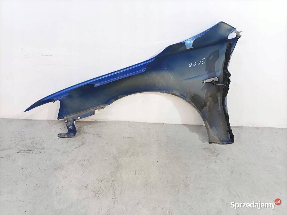 BŁOTNIK PRAWY PRZÓD D06 Mitsubishi Lancer VIII Błotniki