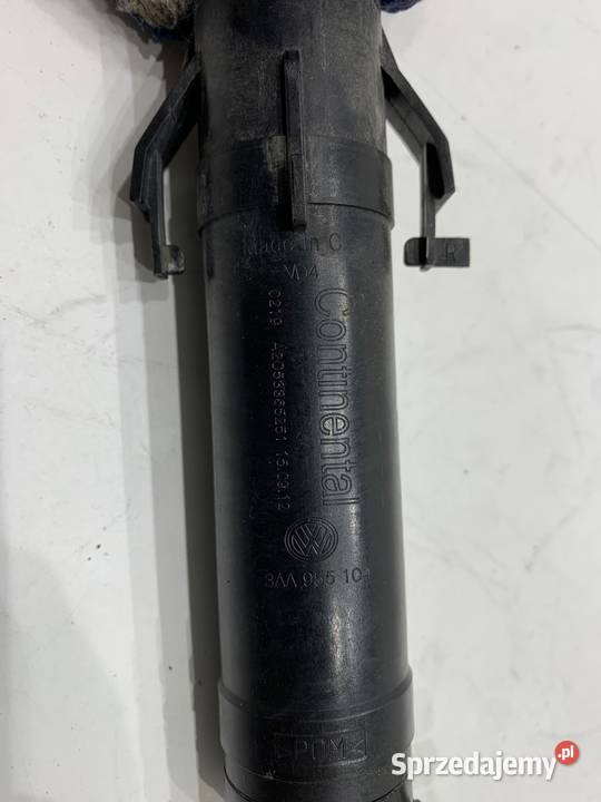 SPRYSKIWACZ REFLEKTORA PRAWY PRZÓD VW PASSAT B7