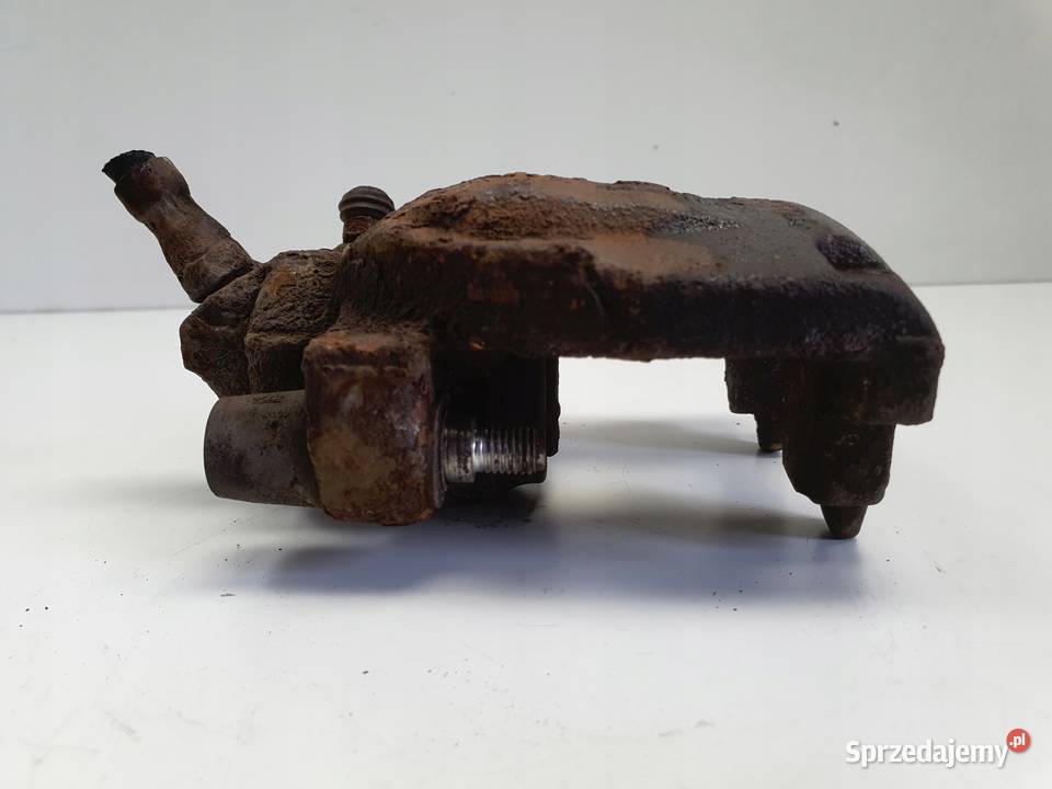 Volvo S60 I V70 II TYLNY ZACISK HAMULCOWY lewy osobowe Części samochodowe lubelskie Rudka