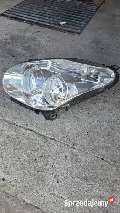 Reflektor lewy lampa lewa Fiat Doblo Opel combo osobowe Biała Rawska
