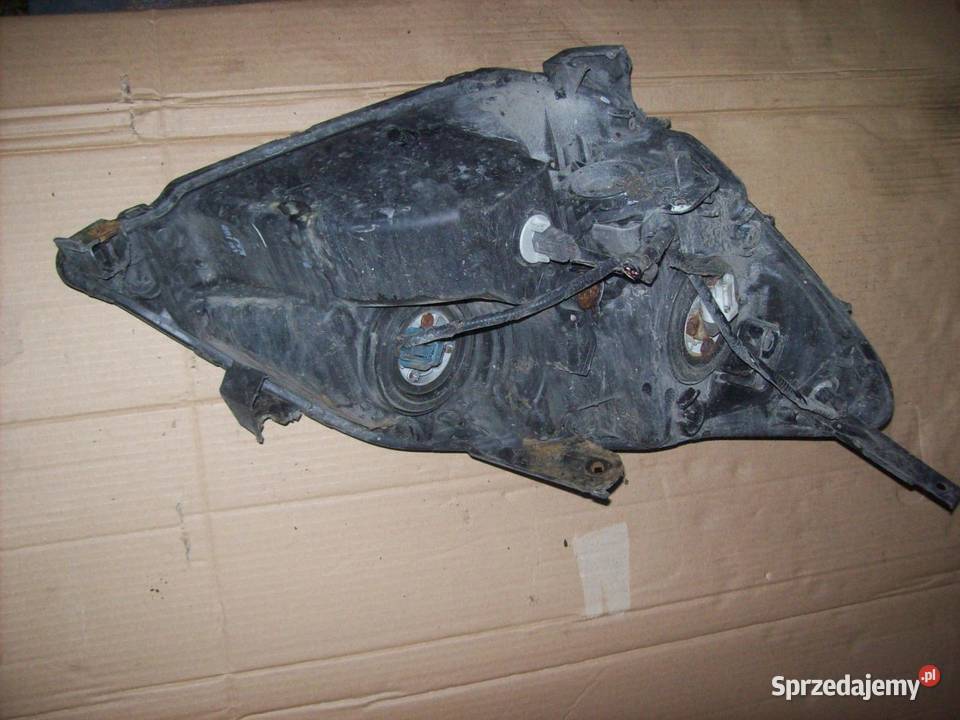 Odyssey 06r Lampa prawa lewa przod przednia