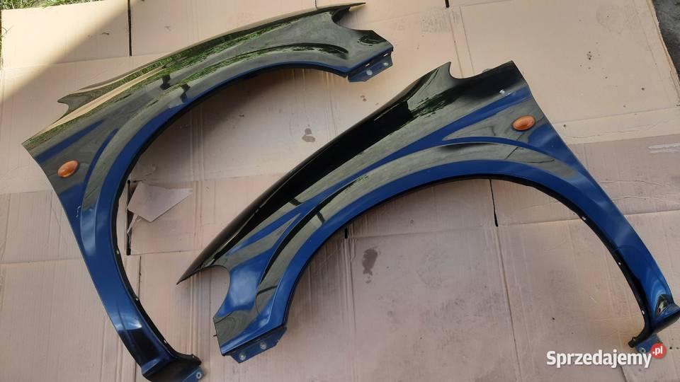 błotnik prawy lewy Chrysler Voyager IV czarny Błotniki Dębno