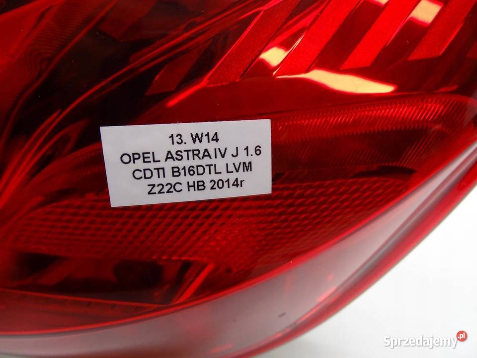LAMPA PRAWY TYŁ PRAWA TYLNA W BŁOTNIK OPEL ASTRA