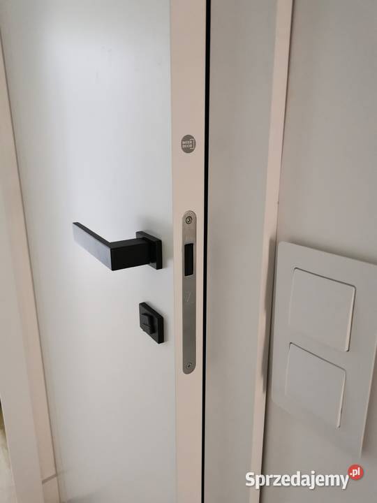 Montaż klamek Warszawa