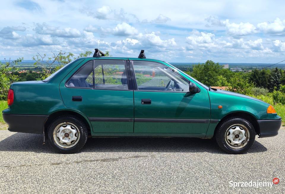 SUZUKI SWIFT CZĘŚCI SKRZYNIA BŁOTNIK DRZWI KLAPA nieuszkodzony Rąbień AB